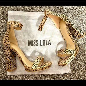 Cheetah high heels size 7 about 4 inch heel, never worn